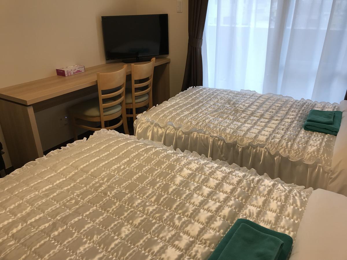 Appartamento Weekly Harbourview Mansion Ginowan Esterno foto