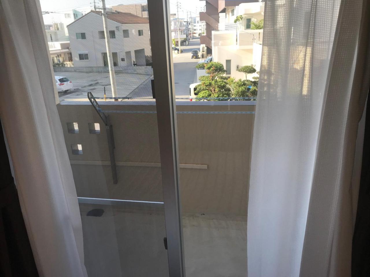 Appartamento Weekly Harbourview Mansion Ginowan Esterno foto